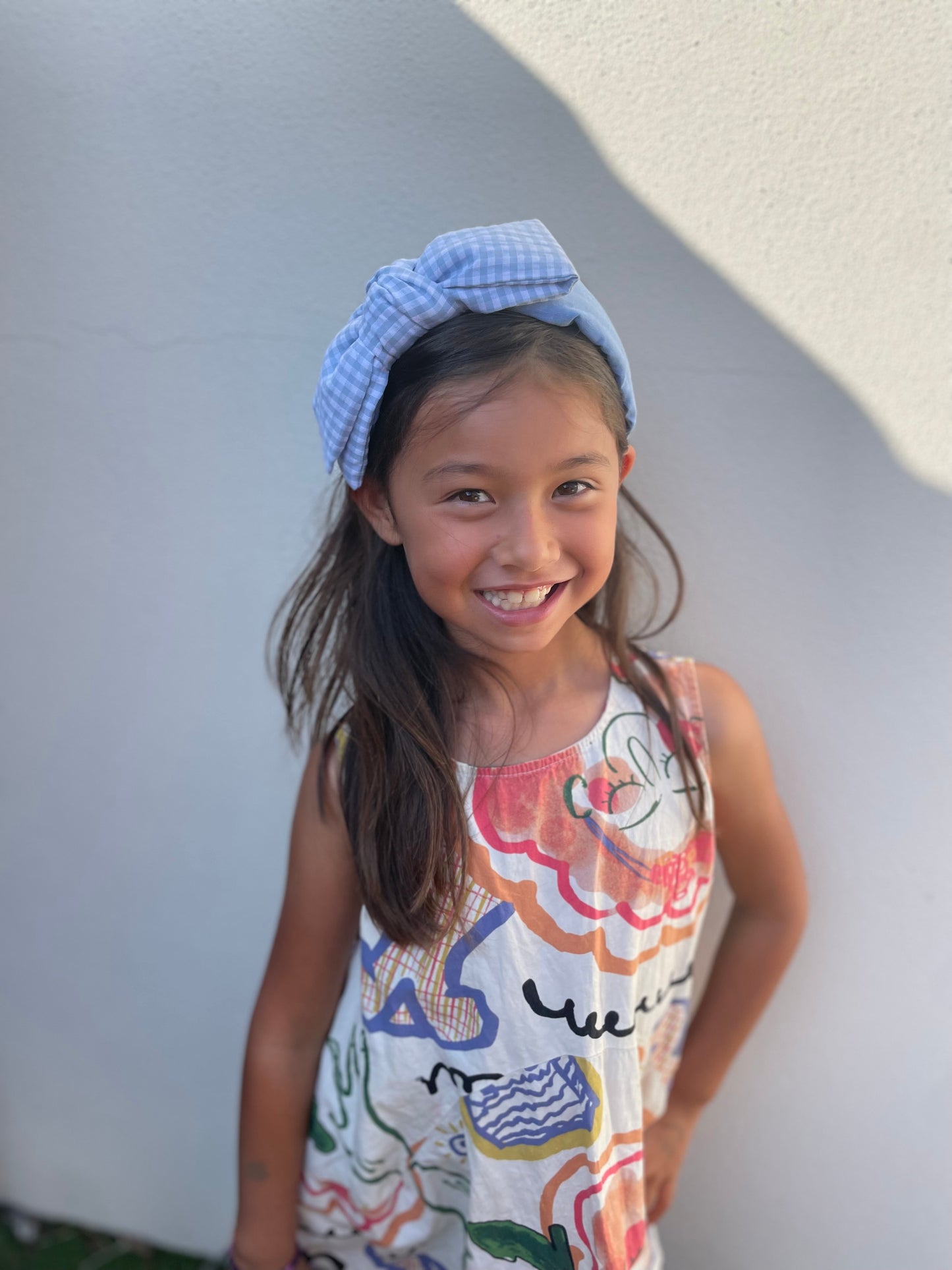 Baby blue gingham twisted bow headband