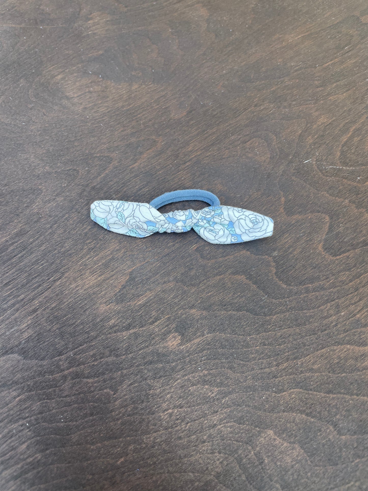 Wild rose in blue hair tie