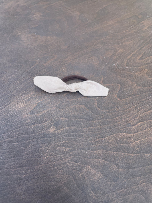 Beige hair tie