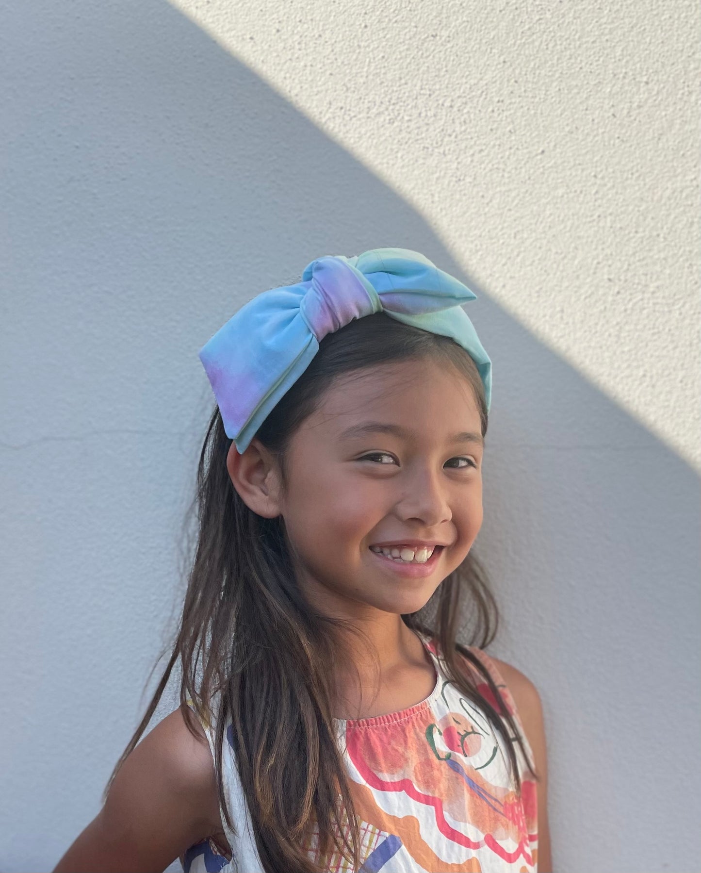 Tie-dye twisted bow headband