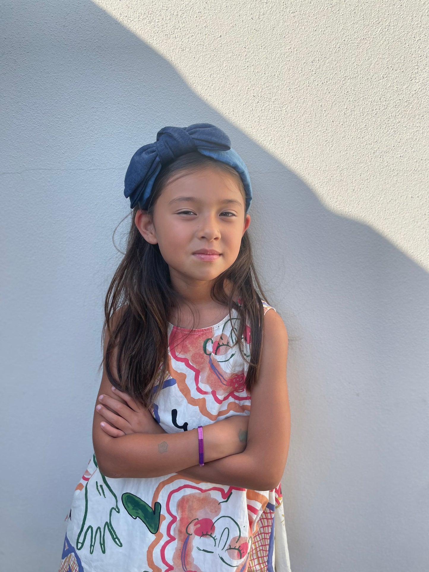 Denim on denim twisted bow headband