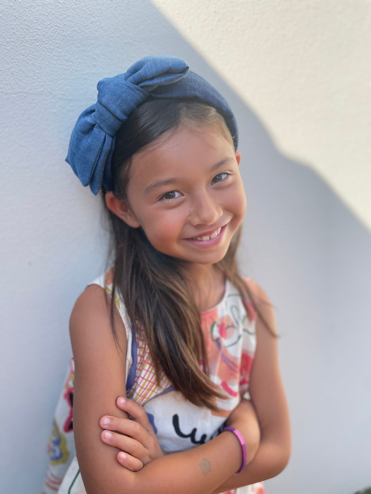 Denim on denim twisted bow headband